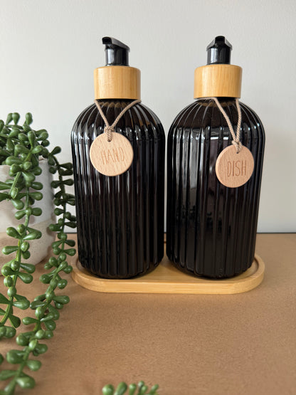 Dispenser bottles with wooden tray
